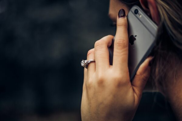 a woman talking to someone on the phone