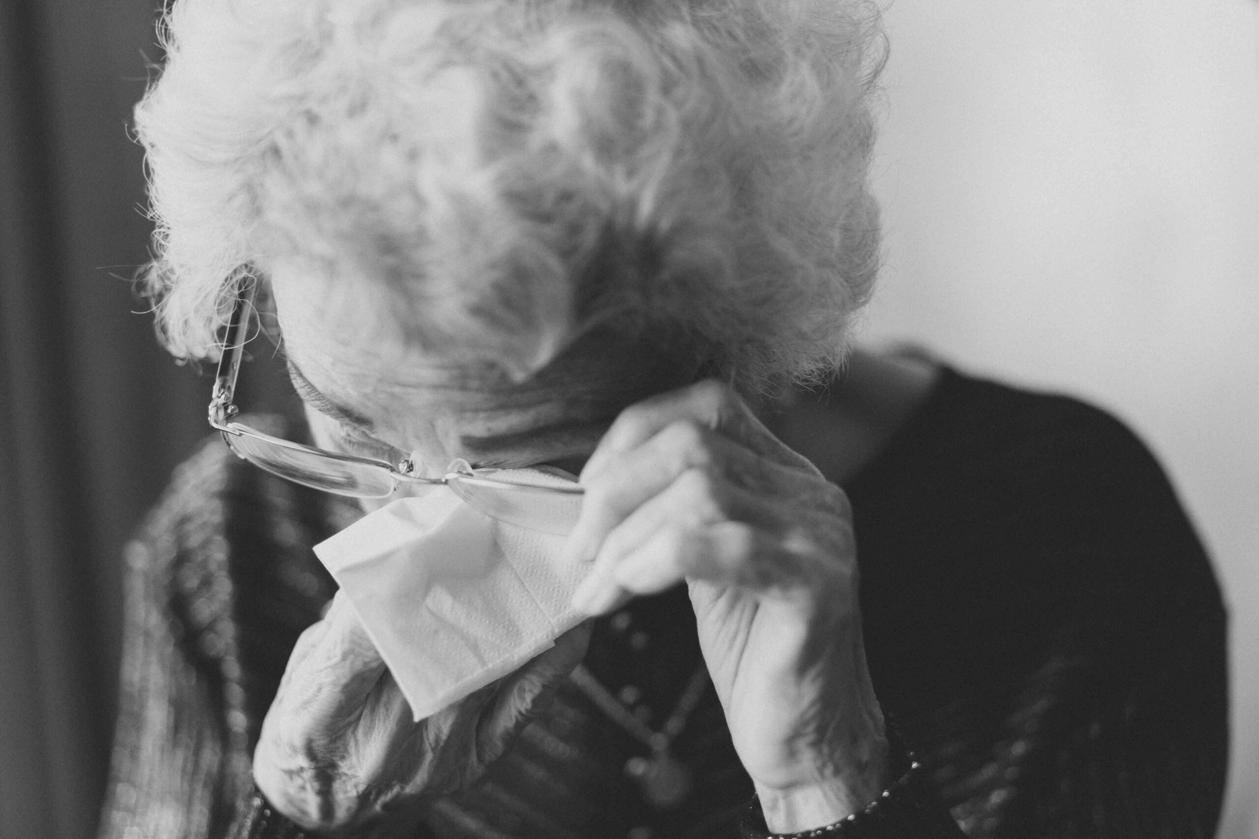 A grandmother who is clearly coping with loss of a loved one