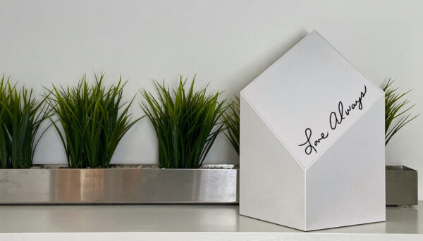 a custom modern urn that says love always in remembrance of a loved one lost